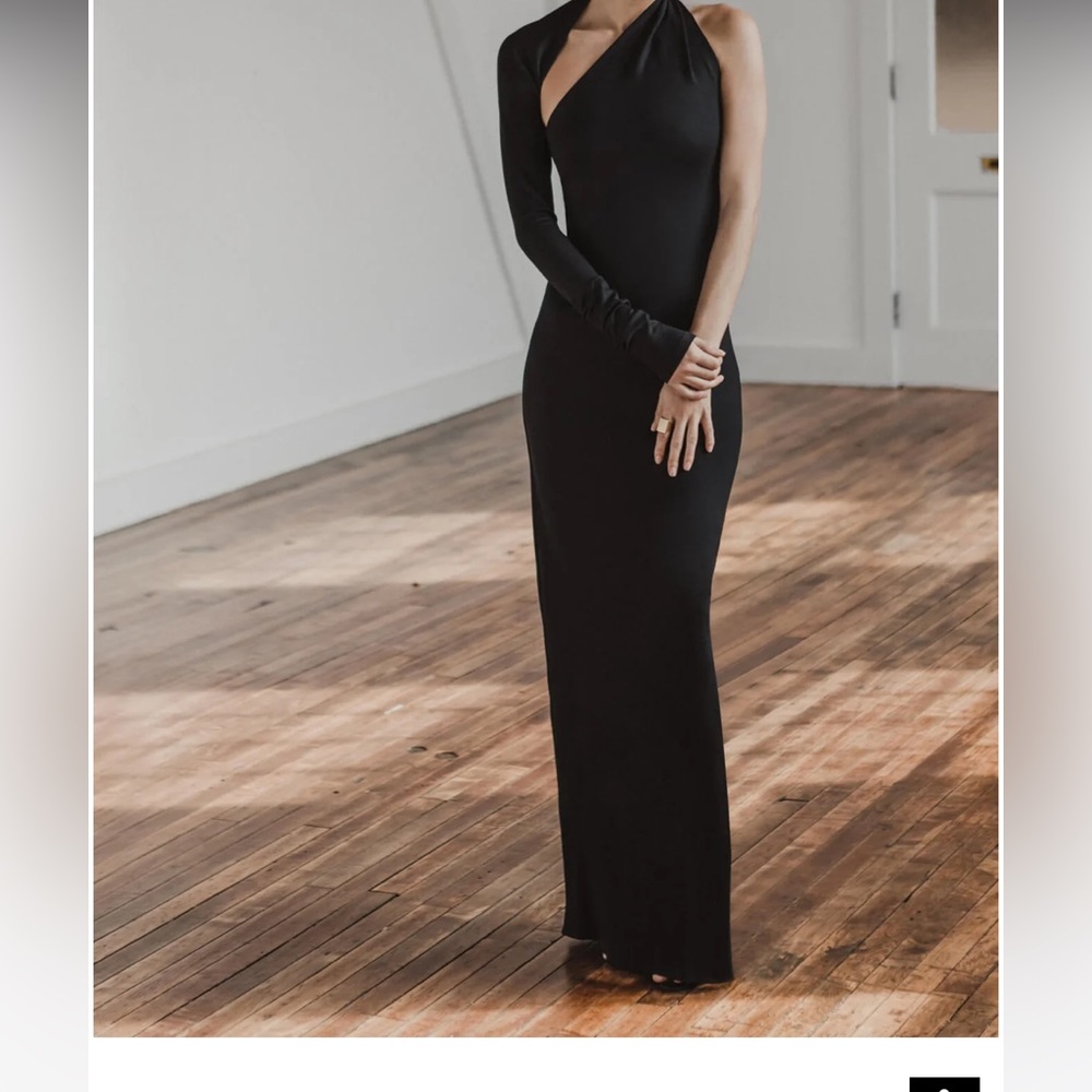 Black Marcella Manhattan One Shoulder gown.